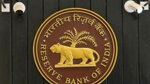 CCTV cameras are seen installed above the logo of Reserve Bank of India (RBI) inside its headquarters in Mumbai.(REUTERS) CCTV cameras are seen installed above the logo of Reserve Bank of India (RBI) inside its headquarters in Mumbai.(REUTERS)