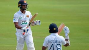 Sri Lanka’s Dinesh Chandimal (L) celebrates after scoring a half-century (50 runs) with his teammate Niroshan Dickwella(Getty Images) Sri Lanka’s Dinesh Chandimal (L) celebrates after scoring a half-century (50 runs) with his teammate Niroshan Dickwella(Getty Images)