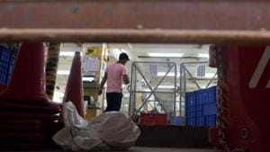 MNS activists carrying party flags barged into the company compound, ransacked the furniture and broke window glasses with stick.(HT PHOTO) MNS activists carrying party flags barged into the company compound, ransacked the furniture and broke window glasses with stick.(HT PHOTO)