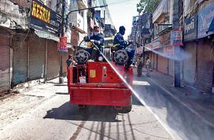 Fire brigade and MC teams spraying disinfectant in Chaura Bazaar old city market in the early months of the pandemic outbreak in Ludhiana.(HT File) Fire brigade and MC teams spraying disinfectant in Chaura Bazaar old city market in the early months of the pandemic outbreak in Ludhiana.(HT File)