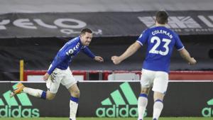 Everton's Gylfi Sigurdsson, left, celebrates after scoring his side's first goal during the English Premier League soccer match between Sheffield United and Everton at the Bramall Lane stadium in Sheffield, England, Saturday, Dec. 26, 2020.(AP) Everton's Gylfi Sigurdsson, left, celebrates after scoring his side's first goal during the English Premier League soccer match between Sheffield United and Everton at the Bramall Lane stadium in Sheffield, England, Saturday, Dec. 26, 2020.(AP)