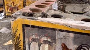 Frescoes on an ancient counter discovered during excavations in Pompeii, Italy, are seen in this handout picture released December 26, 2020. Pompeii Archaeological Park/Ministry of Cultural Heritage and Activities and Tourism.(REUTERS) Frescoes on an ancient counter discovered during excavations in Pompeii, Italy, are seen in this handout picture released December 26, 2020. Pompeii Archaeological Park/Ministry of Cultural Heritage and Activities and Tourism.(REUTERS)