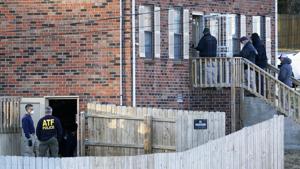FBI and ATF agents investigate a home in Nashville, Tennessee. An explosion that shook the largely deserted streets of downtown Nashville early Christmas morning shattered windows, damaged buildings, and wounded three people. Authorities said they believed the blast was intentional.(AP) FBI and ATF agents investigate a home in Nashville, Tennessee. An explosion that shook the largely deserted streets of downtown Nashville early Christmas morning shattered windows, damaged buildings, and wounded three people. Authorities said they believed the blast was intentional.(AP)