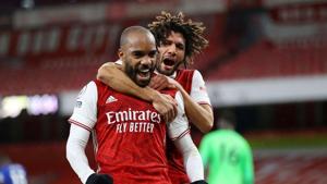 Premier League - Arsenal v Chelsea - Emirates Stadium, London, Britain - December 26, 2020 Arsenal's Alexandre Lacazette celebrates scoring their first goal(Pool via REUTERS) Premier League - Arsenal v Chelsea - Emirates Stadium, London, Britain - December 26, 2020 Arsenal's Alexandre Lacazette celebrates scoring their first goal(Pool via REUTERS)
