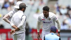 India's Umesh Yadav, top right, receives treatment during play on day three of the second cricket test between India and Australia at the Melbourne Cricket Ground, Melbourne, Australia, Monday, Dec. 28, 2020.(AP) India's Umesh Yadav, top right, receives treatment during play on day three of the second cricket test between India and Australia at the Melbourne Cricket Ground, Melbourne, Australia, Monday, Dec. 28, 2020.(AP)