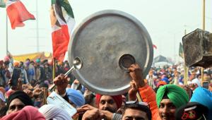 New Delhi India - December 27, 2020: Protesting farmers clank utensils and raise slogans at Delhi-UP border amid protest against new farm laws, in New Delhi, India, on Sunday, December 27, 2020. (Photo by Sakib Ali /Hindustan Times) New Delhi India - December 27, 2020: Protesting farmers clank utensils and raise slogans at Delhi-UP border amid protest against new farm laws, in New Delhi, India, on Sunday, December 27, 2020. (Photo by Sakib Ali /Hindustan Times)