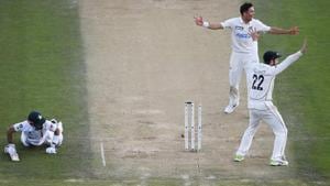 Pakistan captain Mohammad Rizwan, left, is run out after a direct throw by Mitchell Santner, not pictured, as Trent Boult and Kane Williamson, right, appeal during play on day three of the first cricket test between Pakistan and New Zealand at Bay Oval, Mount Maunganui.(AP) Pakistan captain Mohammad Rizwan, left, is run out after a direct throw by Mitchell Santner, not pictured, as Trent Boult and Kane Williamson, right, appeal during play on day three of the first cricket test between Pakistan and New Zealand at Bay Oval, Mount Maunganui.(AP)