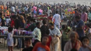 People crowd at a Juhu beach in Mumbai, India, Saturday, Dec. 26, 2020. India's confirmed coronavirus cases have crossed 10 million with new infections dipping to their lowest levels in three months.(AP) People crowd at a Juhu beach in Mumbai, India, Saturday, Dec. 26, 2020. India's confirmed coronavirus cases have crossed 10 million with new infections dipping to their lowest levels in three months.(AP)