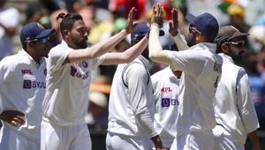 India's MD Siraj, second left, is congratulated by teammates after taking the wicket of Australia's Nathan Lyon during play on day four of the second cricket test between India and Australia at the Melbourne Cricket Ground, Melbourne, Australia, Tuesday, Dec. 29, 2020(AP) India's MD Siraj, second left, is congratulated by teammates after taking the wicket of Australia's Nathan Lyon during play on day four of the second cricket test between India and Australia at the Melbourne Cricket Ground, Melbourne, Australia, Tuesday, Dec. 29, 2020(AP)