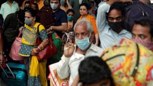 People wearing protective masks exit a railway station amid the spread of the coronavirus disease (Covid-19) in Mumbai, India.(REUTERS) People wearing protective masks exit a railway station amid the spread of the coronavirus disease (Covid-19) in Mumbai, India.(REUTERS)