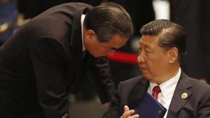 China’s President Xi Jinping speaks to Foreign Minister Wang Yi during the APEC-ASEAN dialogue on the sidelines of the Asia-Pacific Economic Cooperation (APEC) leaders’ summit in Vietnam.(AFP File Photo) China’s President Xi Jinping speaks to Foreign Minister Wang Yi during the APEC-ASEAN dialogue on the sidelines of the Asia-Pacific Economic Cooperation (APEC) leaders’ summit in Vietnam.(AFP File Photo)