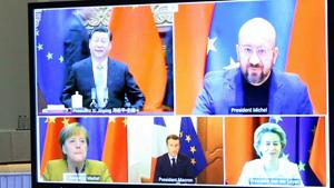 Xi Jinping, China's president, top left, Charles Michel, president of the European Council, top right, Angela Merkel, Germany's chancellor, bottom right, Emmanuel Macron, France’s president, bottom center, and Ursula von der Leyen, European Commission president, on a monitor during a EU-China investment accord virtual meeting in the Europa Building in Brussels, Belgium.(Bloomberg) Xi Jinping, China's president, top left, Charles Michel, president of the European Council, top right, Angela Merkel, Germany's chancellor, bottom right, Emmanuel Macron, France’s president, bottom center, and Ursula von der Leyen, European Commission president, on a monitor during a EU-China investment accord virtual meeting in the Europa Building in Brussels, Belgium.(Bloomberg)