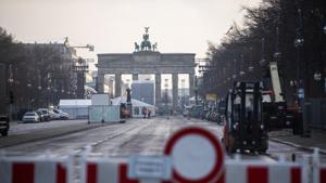 The street leading to the Brandenburg Gate in Berlin, Germany is seen closed on Thursday Dec. 29, 2020 as set-up work starts for the digital New Year's Eve party The street leading to the Brandenburg Gate in Berlin, Germany is seen closed on Thursday Dec. 29, 2020 as set-up work starts for the digital New Year's Eve party
