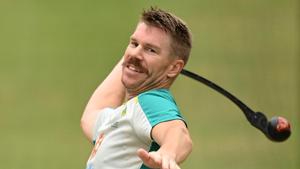 David Warner of Australia warms up in the nets during day two of the Second Test match between Australia and India at Melbourne Cricket Ground.(Getty Images)