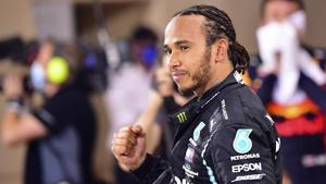 Mercedes driver Lewis Hamilton of Britain celebrates after wining the Formula One race in Bahrain International Circuit in Sakhir, Bahrain.(AP) Mercedes driver Lewis Hamilton of Britain celebrates after wining the Formula One race in Bahrain International Circuit in Sakhir, Bahrain.(AP)