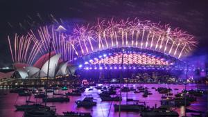 Fireworks explode over the Sydney Opera House and Harbour Bridge as New Year celebrations begin in Sydney, Australia, Thursday, Dec. 31, 2020. One million people would usually crowd the Sydney Harbor to watch the annual fireworks that center on the Sydney Harbour Bridge. But this year authorities advised revelers to watch the fireworks on television as the two most populous states, New South Wales and Victoria battle to curb new COVID-19 outbreaks.(AP) Fireworks explode over the Sydney Opera House and Harbour Bridge as New Year celebrations begin in Sydney, Australia, Thursday, Dec. 31, 2020. One million people would usually crowd the Sydney Harbor to watch the annual fireworks that center on the Sydney Harbour Bridge. But this year authorities advised revelers to watch the fireworks on television as the two most populous states, New South Wales and Victoria battle to curb new COVID-19 outbreaks.(AP)