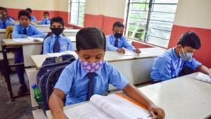 Students attending class maintaining Covid-19 guidelines at a school in Nagaon, Assam.(PTI) Students attending class maintaining Covid-19 guidelines at a school in Nagaon, Assam.(PTI)