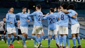 Manchester City's Ferran Torres celebrates scoring their second goal with teammates.(Pool via REUTERS) Manchester City's Ferran Torres celebrates scoring their second goal with teammates.(Pool via REUTERS)