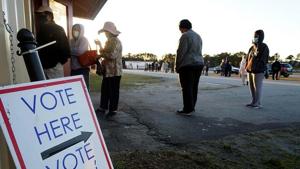 Voters stand in line during the first day of early voting in Atlanta, Georgia.(Bloomberg file photo) Voters stand in line during the first day of early voting in Atlanta, Georgia.(Bloomberg file photo)
