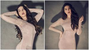 Nora Fatehi welcomes New Year in a bedazzled bodycon dress(Instagram/manekaharisinghani) Nora Fatehi welcomes New Year in a bedazzled bodycon dress(Instagram/manekaharisinghani)