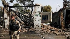 An Afghan security force member inspects at the site of a blast in Kabul, Afghanistan.(REUTERS) An Afghan security force member inspects at the site of a blast in Kabul, Afghanistan.(REUTERS)