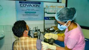 A medic administers Covaxin, developed by Bharat Biotech in collaboration with the Indian Council of Medical Research (ICMR), during the Phase- 3 trials at the People's Medical College in Bhopal.(PTI) A medic administers Covaxin, developed by Bharat Biotech in collaboration with the Indian Council of Medical Research (ICMR), during the Phase- 3 trials at the People's Medical College in Bhopal.(PTI)