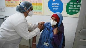 A health worker and volunteer take part in a in mock vaccination, as part of a nationwide dry run for Covid-19 vaccinations, at a government primary health centre in Jaipur on January 2. With the objective to gear up for the roll-out of Covid-19 vaccines across the country, a dry run was conducted by all States and UT governments on January 2. (Himanshu Vyas / HT Photo) A health worker and volunteer take part in a in mock vaccination, as part of a nationwide dry run for Covid-19 vaccinations, at a government primary health centre in Jaipur on January 2. With the objective to gear up for the roll-out of Covid-19 vaccines across the country, a dry run was conducted by all States and UT governments on January 2. (Himanshu Vyas / HT Photo)