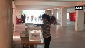 Due to the prevailing Covid-19 situation, polling stations are being sanitised regularly, voters have to ensure social distancing while casting their votes and wearing masks is mandatory. Votes are being cast through the paper ballot system.(ANI Photo) Due to the prevailing Covid-19 situation, polling stations are being sanitised regularly, voters have to ensure social distancing while casting their votes and wearing masks is mandatory. Votes are being cast through the paper ballot system.(ANI Photo)