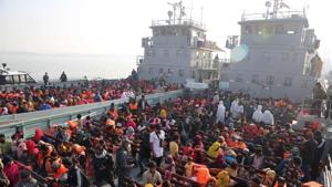 Rohingya refugees wait on naval ships in Chittagong to be transported to the Bhasan Char island in the Baay of Bengal on December 29. Bangladesh navy ships transported a second batch comprising 1,804 Rohingya refugees from crowded camps in Cox’s Bazar district to Bhashan Char island, 34 kilometers from the mainland, after a four-hour naval journey from the port city of Chittagong. (Mahmud Hossain Opu / AP) Rohingya refugees wait on naval ships in Chittagong to be transported to the Bhasan Char island in the Baay of Bengal on December 29. Bangladesh navy ships transported a second batch comprising 1,804 Rohingya refugees from crowded camps in Cox’s Bazar district to Bhashan Char island, 34 kilometers from the mainland, after a four-hour naval journey from the port city of Chittagong. (Mahmud Hossain Opu / AP)