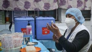 A health worker takes part in a dry run or a mock drill for Covid-19 vaccine delivery at a model vaccination centre at Ansari Road in New Delhi.(Sanchit Khanna/HT Photo) A health worker takes part in a dry run or a mock drill for Covid-19 vaccine delivery at a model vaccination centre at Ansari Road in New Delhi.(Sanchit Khanna/HT Photo)