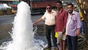 Water coming out of a pipeline valve at Birla College Road in Kalyan (W) after it was damaged by a vehicle on Saturday morning.(HT photo) Water coming out of a pipeline valve at Birla College Road in Kalyan (W) after it was damaged by a vehicle on Saturday morning.(HT photo)