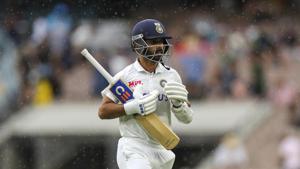India's Ajinkya Rahane walks from the field as the rain starts during play on day two of the second cricket test between India and Australia at the Melbourne Cricket Ground.(AP) India's Ajinkya Rahane walks from the field as the rain starts during play on day two of the second cricket test between India and Australia at the Melbourne Cricket Ground.(AP)