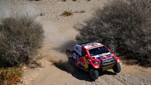 Toyota's Qatari driver Nasser Al-Attiyah and his co-driver Mathieu Baumel of France compete during Stage 1 of the 2021 Dakar Rally between Jeddah and Bisha in Saudi Arabia on January 3. The Dakar Rally kicks off on January 3 in Saudi Arabia, the second time the world’s most gruelling event in motorsport’s calendar has been held in the kingdom amid continued accusations of “sportswashing”. (Franck Fife / AFP) Toyota's Qatari driver Nasser Al-Attiyah and his co-driver Mathieu Baumel of France compete during Stage 1 of the 2021 Dakar Rally between Jeddah and Bisha in Saudi Arabia on January 3. The Dakar Rally kicks off on January 3 in Saudi Arabia, the second time the world’s most gruelling event in motorsport’s calendar has been held in the kingdom amid continued accusations of “sportswashing”. (Franck Fife / AFP)