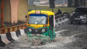 Vehicles crossing a waterlogged stretch after morning rains near AIIMS Hospital in New Delhi on Sunday.(Amal KS/HT PHOTO) Vehicles crossing a waterlogged stretch after morning rains near AIIMS Hospital in New Delhi on Sunday.(Amal KS/HT PHOTO)