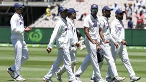 Indian players walk from the field after dismissing Australia for 200 runs in their second innings during play on day four of the second cricket test between India and Australia at the Melbourne Cricket Ground.(AP) Indian players walk from the field after dismissing Australia for 200 runs in their second innings during play on day four of the second cricket test between India and Australia at the Melbourne Cricket Ground.(AP)