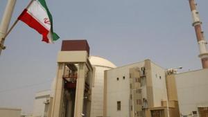 An Iranian flag flutters in front of the reactor building of the Bushehr nuclear power plant, just outside the southern city of Bushehr, Iran.(AP) An Iranian flag flutters in front of the reactor building of the Bushehr nuclear power plant, just outside the southern city of Bushehr, Iran.(AP)