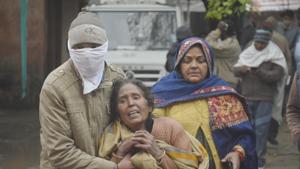 The relatives of a person injured in the collapse of a roof at a crematorium in Muradnagar, seen at MMG district hospital in Ghaziabad, India.(Photo by Sakib Ali /Hindustan Times) The relatives of a person injured in the collapse of a roof at a crematorium in Muradnagar, seen at MMG district hospital in Ghaziabad, India.(Photo by Sakib Ali /Hindustan Times)