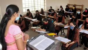 Students attend a class at a college after authorities allowed reopening of schools and colleges in Chikmagalur in Karnataka.(PTI PHOTO.) Students attend a class at a college after authorities allowed reopening of schools and colleges in Chikmagalur in Karnataka.(PTI PHOTO.)