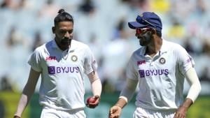 Melbourne : India's MD Siraj, left, and Jasprit Bumrah chat during play on day one of the Boxing Day cricket test between India and Australia at the Melbourne Cricket Ground.(AP) Melbourne : India's MD Siraj, left, and Jasprit Bumrah chat during play on day one of the Boxing Day cricket test between India and Australia at the Melbourne Cricket Ground.(AP)