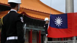 Military honour guards attend a flag-raising ceremony at Chiang Kai-shek Memorial Hall, in Taipei.(REUTERS) Military honour guards attend a flag-raising ceremony at Chiang Kai-shek Memorial Hall, in Taipei.(REUTERS)
