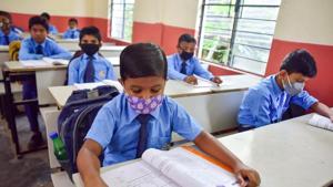 Students attend a class after schools re-opened following a gap of more then seven months due to coronavirus pandemic(PTI) Students attend a class after schools re-opened following a gap of more then seven months due to coronavirus pandemic(PTI)