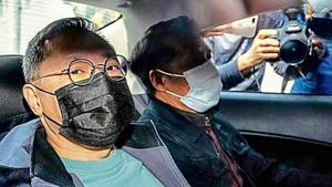 Former law professor Benny Tai (left) after his arrest. Former law professor Benny Tai (left) after his arrest.