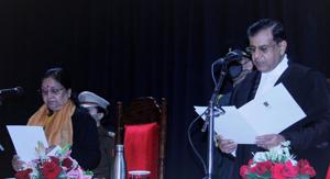 Justice RS Chauhan takes oath as the new Chief Justice of the Uttarakhand High Court on Thursday at a ceremony held at Raj Bhawan.(HT PHOTO.) Justice RS Chauhan takes oath as the new Chief Justice of the Uttarakhand High Court on Thursday at a ceremony held at Raj Bhawan.(HT PHOTO.)