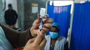 A medic conducts the dry run as part of preparedness for the administration of Covid-19 vaccine, at Kasturba Hospital in New Delhi, on Wednesday.(PTI Photo) A medic conducts the dry run as part of preparedness for the administration of Covid-19 vaccine, at Kasturba Hospital in New Delhi, on Wednesday.(PTI Photo)