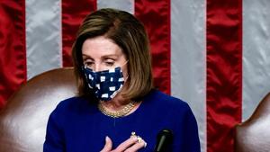 Earlier, House Speaker Nancy Pelosi said Congress’ certifying of Biden’s win will show the world it won’t back down. Pelosi made these comments as the House reconvened after being shut down by unruly pro-Trump protesters at US Capitol.(Reuters Photo) Earlier, House Speaker Nancy Pelosi said Congress’ certifying of Biden’s win will show the world it won’t back down. Pelosi made these comments as the House reconvened after being shut down by unruly pro-Trump protesters at US Capitol.(Reuters Photo)