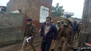 Bulandshahr DM Ravindra Kumar and SSP SK Singh visit the village.(HT photo) Bulandshahr DM Ravindra Kumar and SSP SK Singh visit the village.(HT photo)