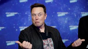 SpaceX owner and Tesla CEO Elon Musk grimaces after arriving on the red carpet for the Axel Springer award, in Berlin, Germany, December 1, 2020. REUTERS/Hannibal Hanschke/Pool/File Photo SpaceX owner and Tesla CEO Elon Musk grimaces after arriving on the red carpet for the Axel Springer award, in Berlin, Germany, December 1, 2020. REUTERS/Hannibal Hanschke/Pool/File Photo