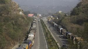 Stranded trucks stand in a line following the closure of the Jammu-Srinagar highway, on the outskirts of Jammu, India.(AP) Stranded trucks stand in a line following the closure of the Jammu-Srinagar highway, on the outskirts of Jammu, India.(AP)
