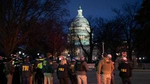 Federal Bureau of Investigation (FBI) agents arrive at Capitol Hill in Washington, D.C.(Bloomberg Photo) Federal Bureau of Investigation (FBI) agents arrive at Capitol Hill in Washington, D.C.(Bloomberg Photo)