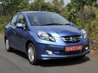 All-new-1-5-litre-98-6bhp-diesel-motor-in-Honda-s-first-compact-saloon-Amaze-claims-a-record-fuel-efficiency-of-25-8-kpl